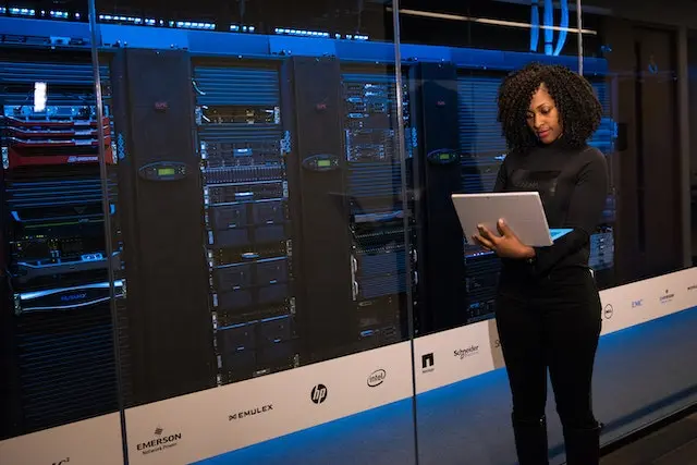 woman standing in data centre